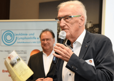 Peter Michalski, Vorsitzender der NHL-Hilfe NRW e.V. bei der Eröffnung des Symposiums